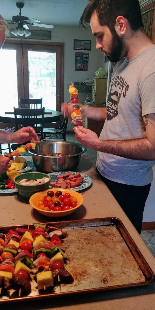 Celebration Beef and Chicken Kabobs Alex skewering