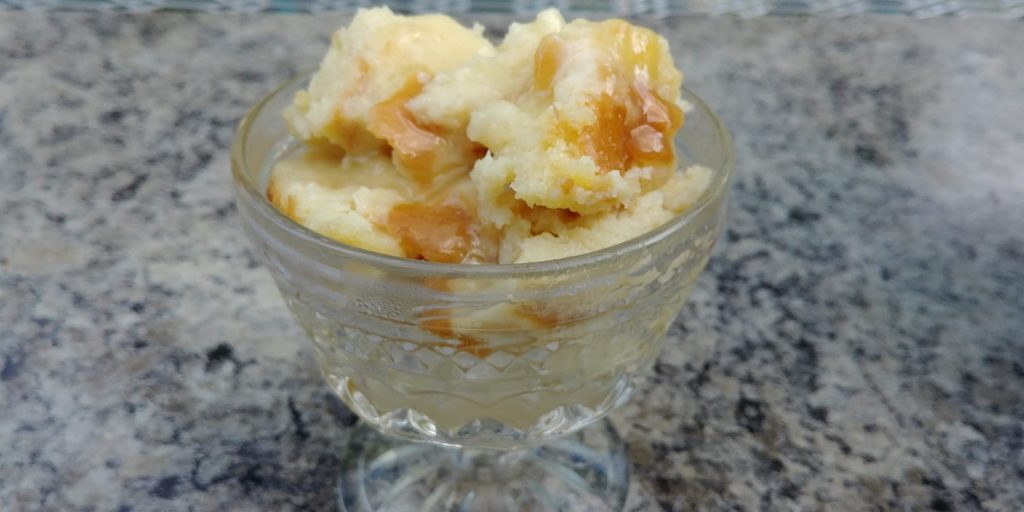 Heirloom Bread Pudding with Vanilla Sauce complete in bowl