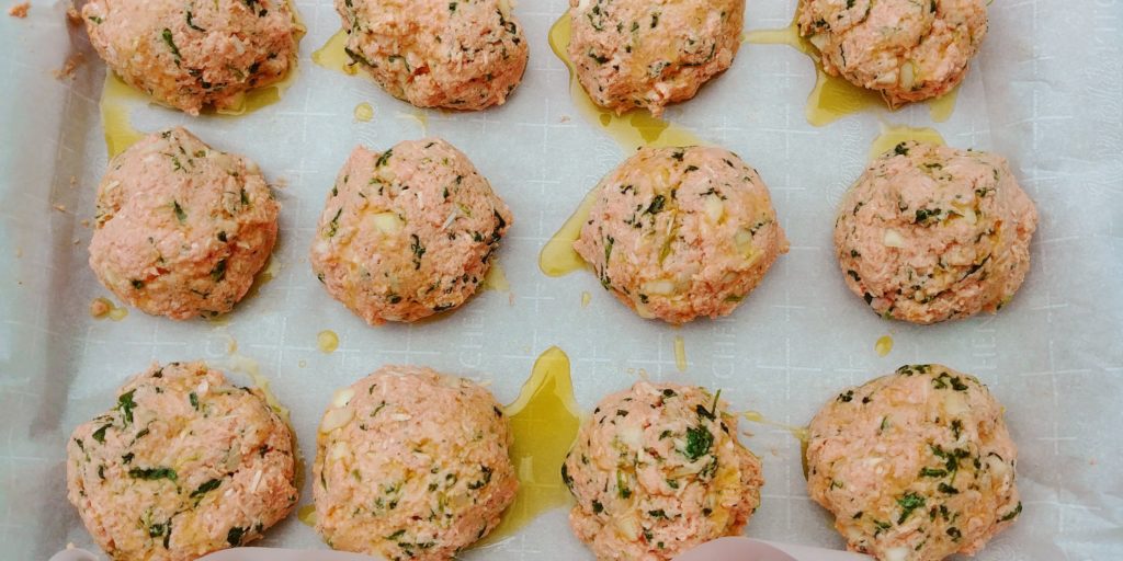 Jumbo Turkey Meatballs uncooked on cookie sheet