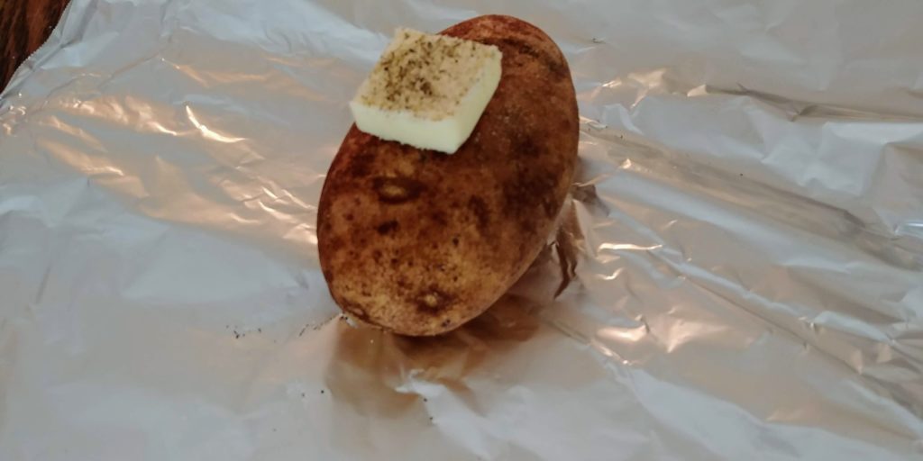 Best Ever Baked Potato Soup unwrapped potato