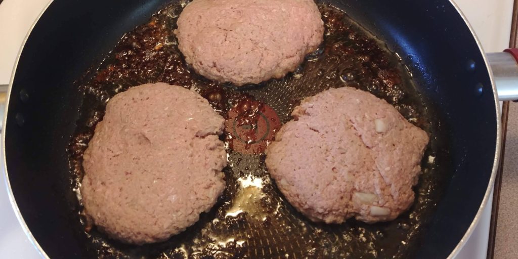Perfect Turkey Burgers patties in skillet before flipping