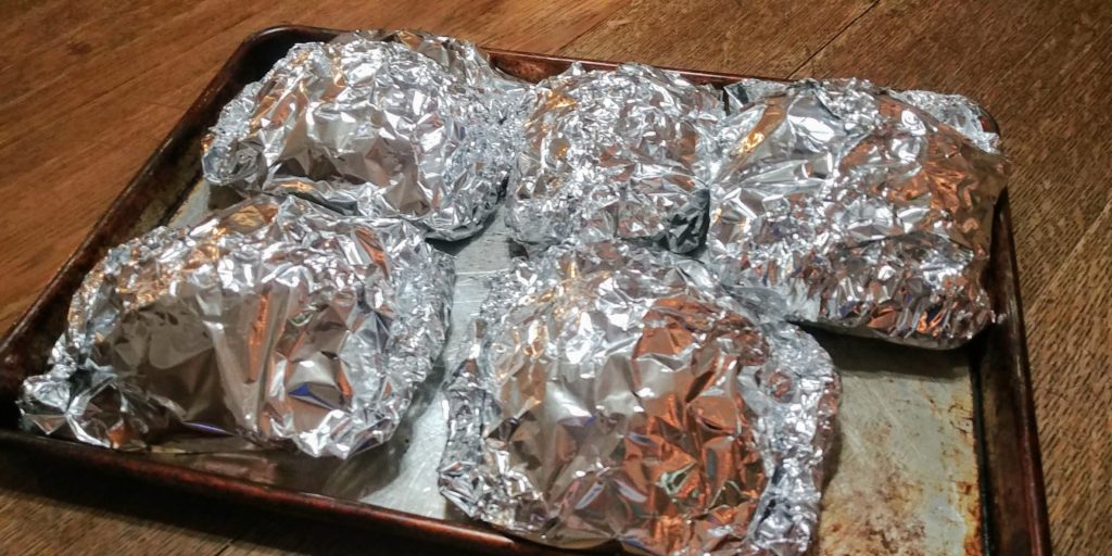 Hobo Burger Packets wrapped on sheet