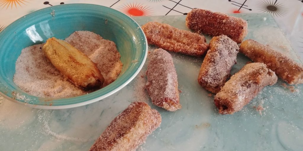 Cinnamon French Toast Rollups fried and rolled in sugar